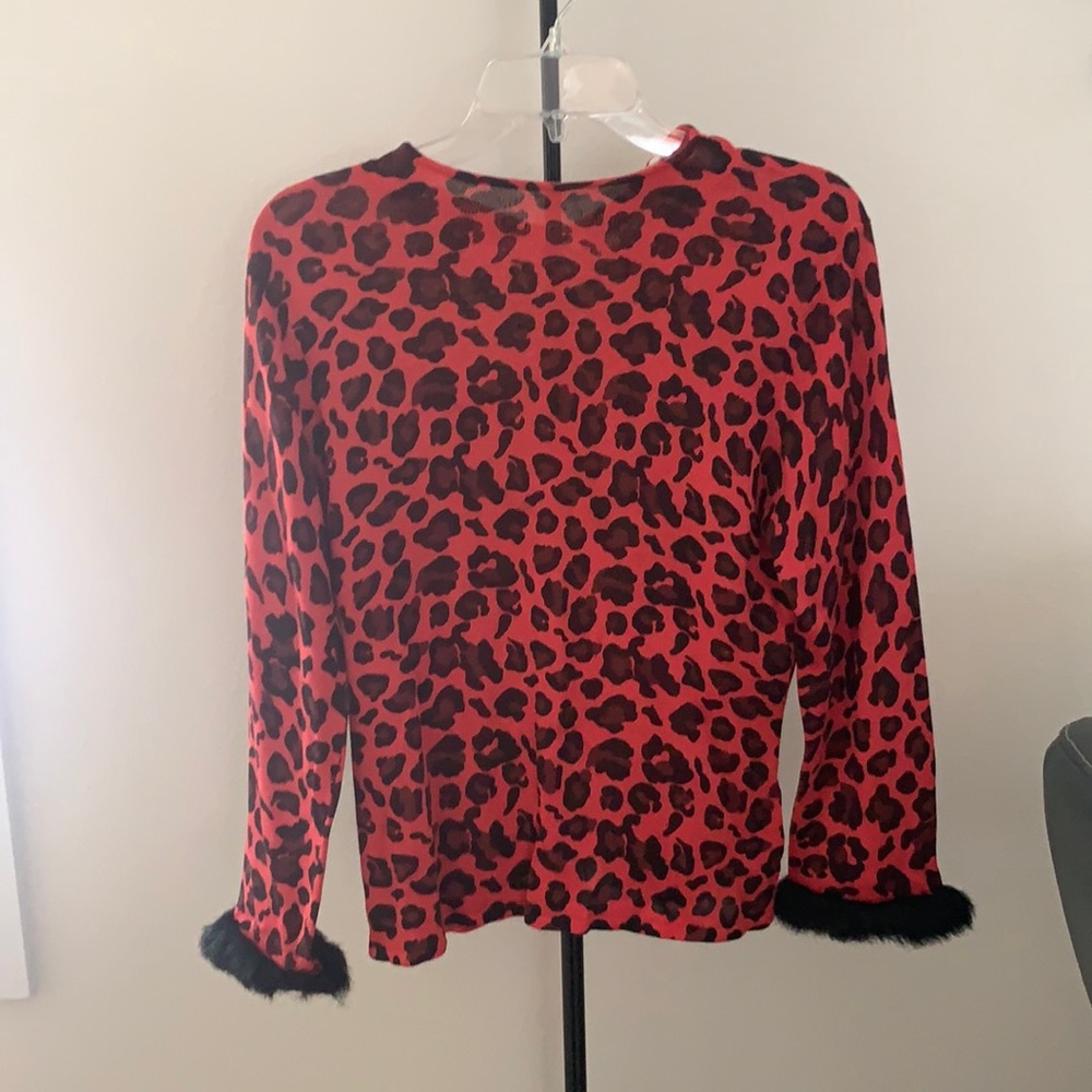 Cool sweater great with leather skirt and boots